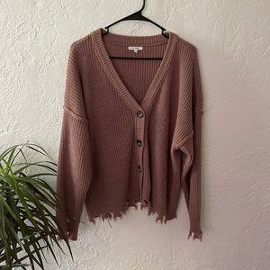 Distressed pink cardigan